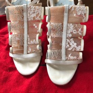 Authentic Christian Louboutin high heels shoes in off white satin and blush lace